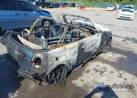 2010 Mini Cooper S z USA, uszkodzony, nr VIN WMWMS3C55ATZ85347